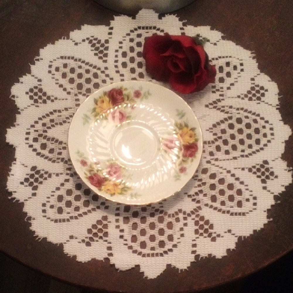 Elegant Floral Saucer with Red and Yellow Accents